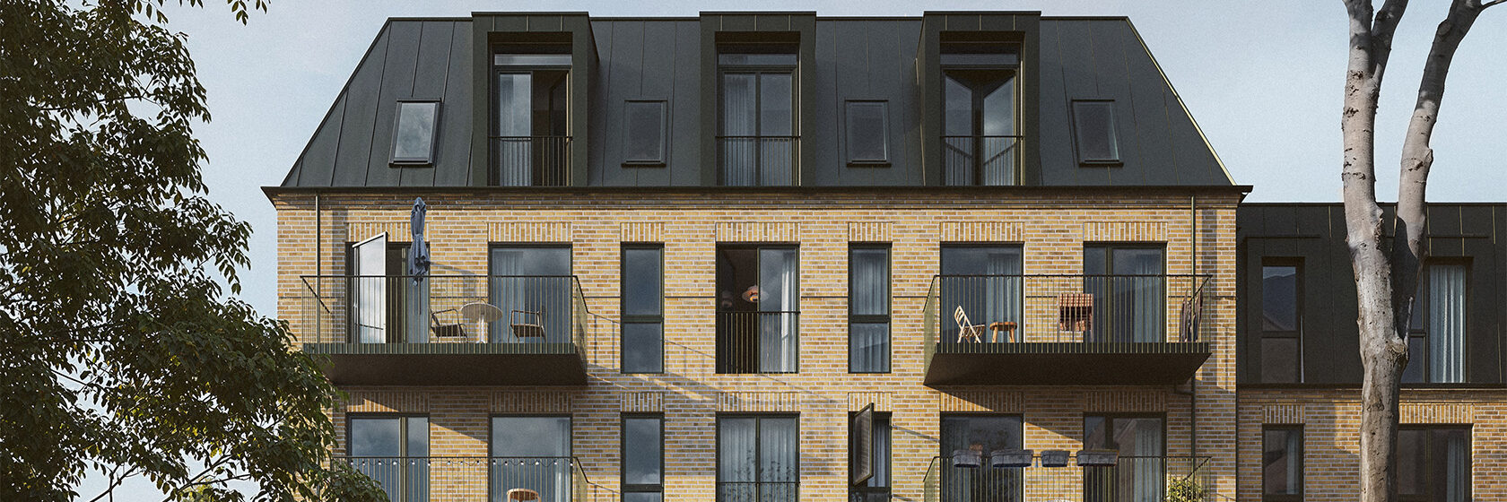 Moderne lejlighedsbygning med balkoner og træer i forgrunden.